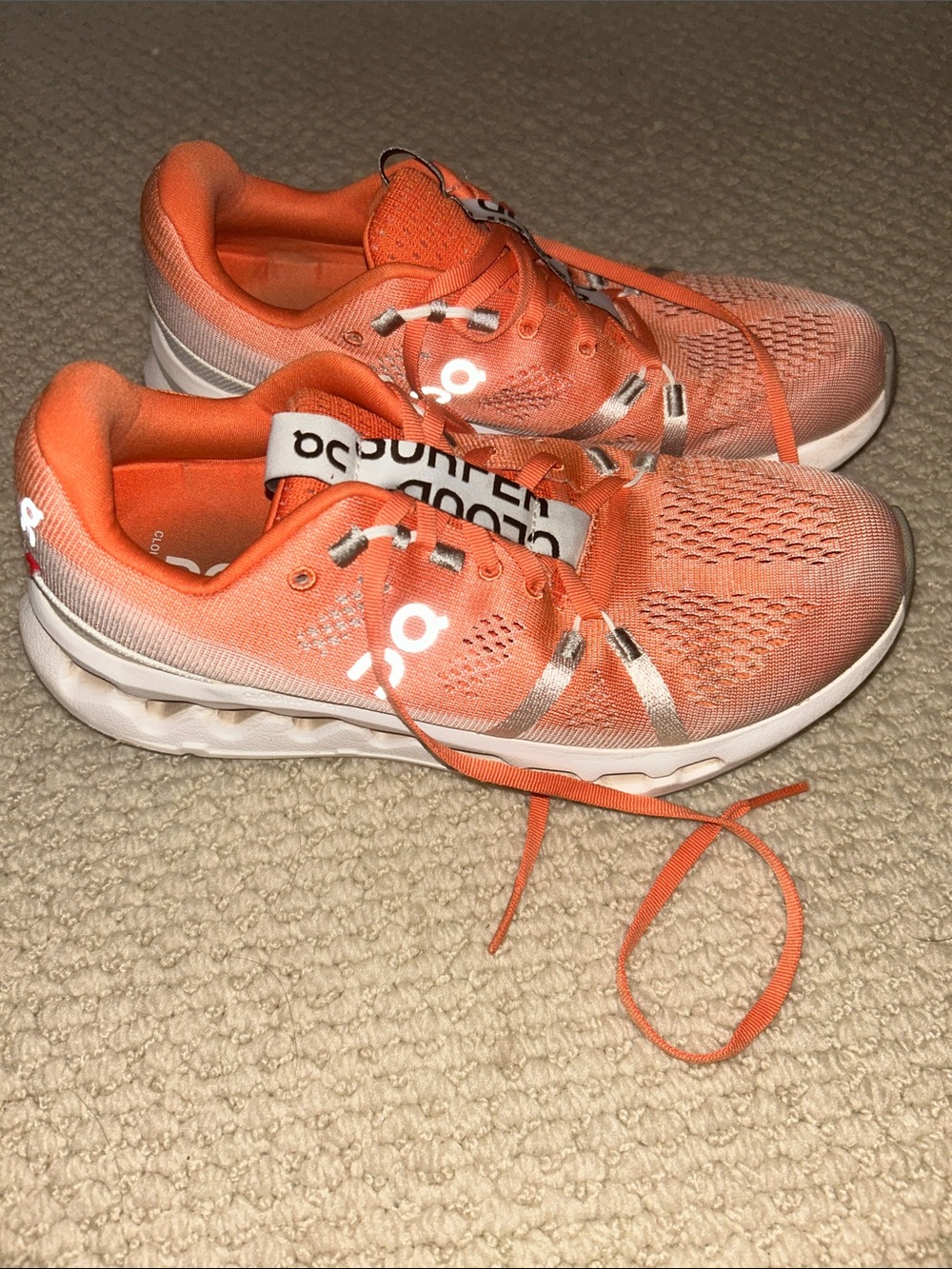 On Running Women’s Cloudflow Sneakers in Coral Orange and White